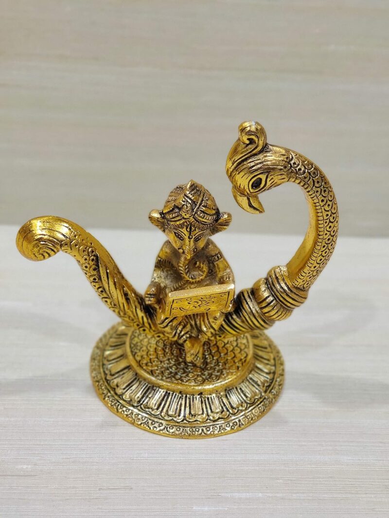 GiftNagri Gold Plated Metal Handicraft New Moon Style Peacock and Ganesha Idol Working On Laptop Hindu God Idols Murti for Return Gift for Students Study Table for Office Table