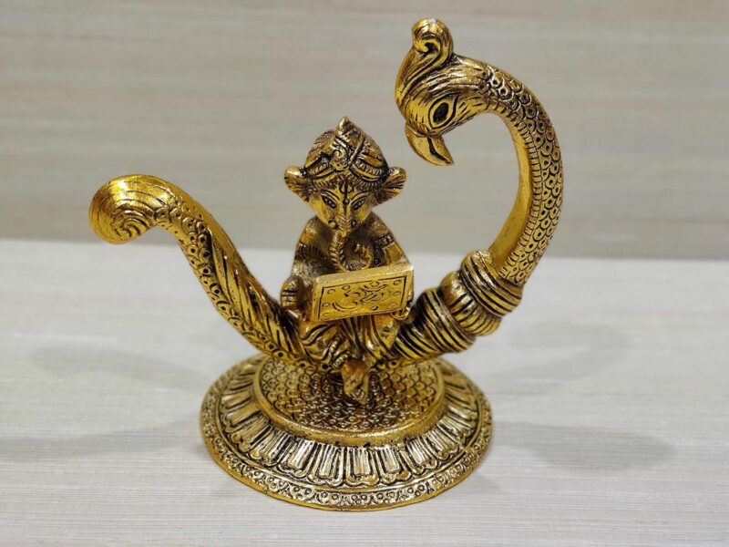 GiftNagri Gold Plated Metal Handicraft New Moon Style Peacock and Ganesha Idol Working On Laptop Hindu God Idols Murti for Return Gift for Students Study Table for Office Table