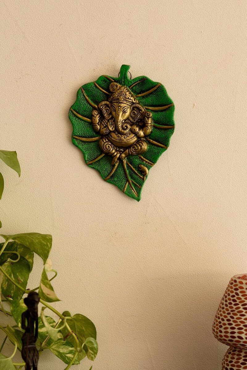 eCraftIndia Metal Golden Lord Ganesha Idol On Green Leaf Ganesha Wall Hanging Decorative Showpiece for Wall Decor- Diwali Decoration Items for Home Decor- Gift for Diwali Ganesh Chaturthi Housewarming